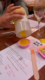Couple making soap together at a Sparkling Mosaic workshop in Amsterdam